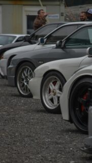 Lineup of Iconic JDM Sports Cars in Matte and White Finish Wallpaper