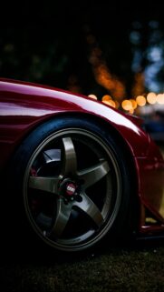 Red Sports Car Bronze Rim Close-Up JDM Mobile Wallpaper
