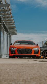 Orange Audi R8 Luxury Vision Board for Wealth and Abundance Wallpaper