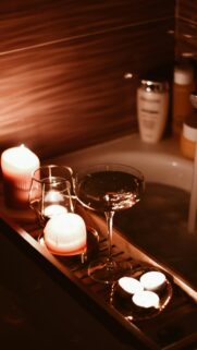 Luxury Bath Night Serenity with Candlelight and Wine Wallpaper