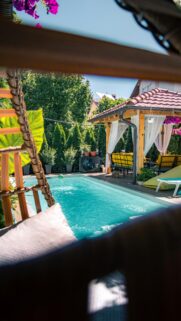 Luxury Poolside Garden Oasis with Gazebo Phone Wallpaper