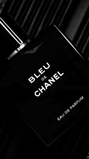 Luxury Bleu de Chanel Eau de Parfum Bottle Dark Aesthetic Wallpaper