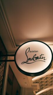 Christian Louboutin Illuminated Round Boutique Sign Mobile Wallpaper