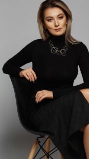 Elegant Business Woman in Black Turtleneck Studio Portrait Wallpaper