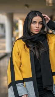 Stylish Woman in Yellow and Black Coat Portrait Mobile Wallpaper