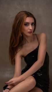 Stunning Portrait of a Woman in a Black Sequin Dress Wallpaper