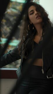 Stunning Fashion Model in Black Leather Jacket Mobile Wallpaper