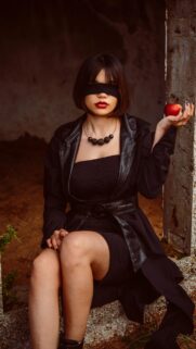 Mysterious Woman with Blindfold and Red Apple Aesthetic Mobile Wallpaper