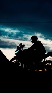 Biker Silhouette at Sunset Sportbike Phone Wallpaper