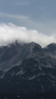 Dramatic Cloud Topped Mountain Peak Mobile Phone Wallpaper