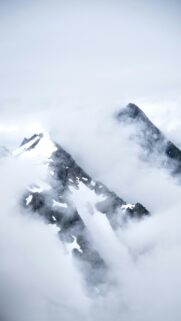 Snowy Mountain Peak Above Clouds Misty Alpine Nature Mobile Wallpaper