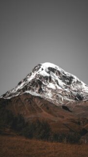 Majestic Snow Capped Mount Kazbek Peak Mobile Wallpaper