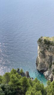 Breathtaking Coastal Cliff Overlooking Turquoise Mediterranean Waters Wallpaper