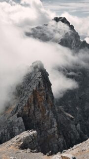Majestic Alpine Peak in Clouds Mobile Wallpaper