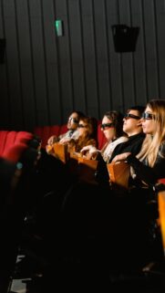 Friends Watching 3D Movie in Cinema Theater High Quality Wallpaper