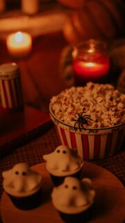 Spooky Ghost Cupcakes and Popcorn Halloween Night Wallpaper