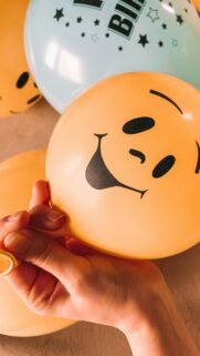 Close-up Happy Smiley Yellow Balloon Aesthetic Phone Wallpaper