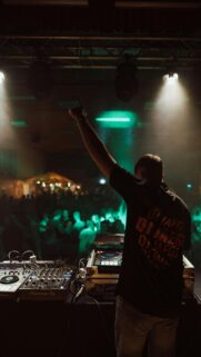 DJ Performing Live at Music Festival Night Club Phone Wallpaper