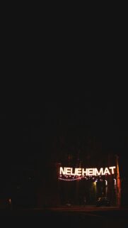 Neue Heimat Neon Sign Night City Street Mobile Wallpaper