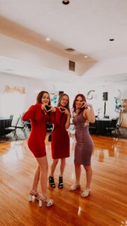 Three Best Friends Posing at a Party Mobile Wallpaper