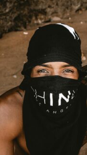 Mysterious Man in Black Face Mask Portrait Mobile Wallpaper