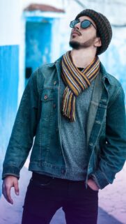 Stylish Man in Denim Jacket and Colorful Scarf Mobile Wallpaper