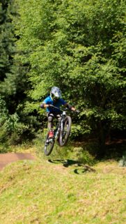 Extreme Mountain Biker Jumping in Nature 4K Mobile Wallpaper