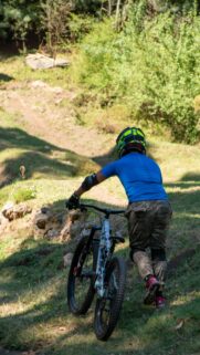 Mountain Biker Ascending Trail Extreme Sports Mobile Wallpaper