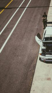White JDM Nissan Skyline R32 Race Car Pit Stop Mobile Wallpaper