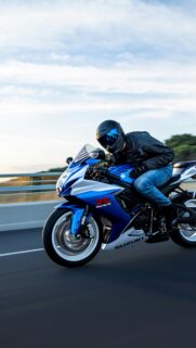 Suzuki GSX-R Sportbike Speeding on Highway Mobile Wallpaper