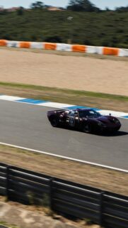 Vintage Dark Maroon Ford GT40 Racing Car on Track Wallpaper