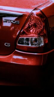Red Toyota Etios Car Tail Light Close Up Macro Mobile Wallpaper