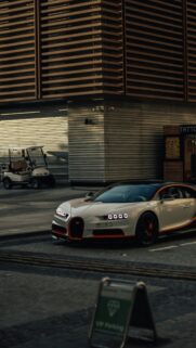 Luxurious White Bugatti Chiron Supercar in Urban Setting Wallpaper