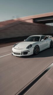 White Porsche 911 GT3 Speeding on Highway Mobile Wallpaper