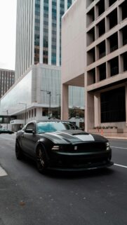 Matte Black Ford Mustang GT Muscle Car City Street 4K Mobile Wallpaper