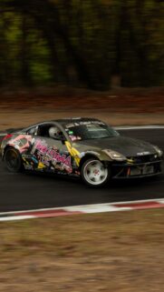 Drifting Nissan 350Z Race Car Action Mobile Wallpaper