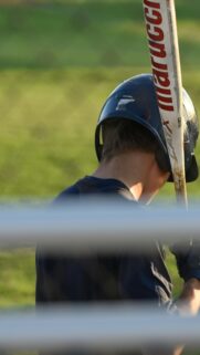 Baseball Batter Focused on the Game Premium Mobile Wallpaper