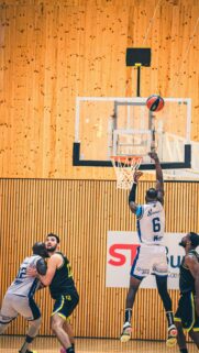 Action Basketball Player Shooting Dunking Jump Shot Wallpaper