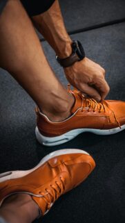 Athletic Orange Sneakers and Fitness Vibe Phone Wallpaper