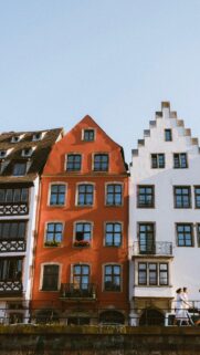 Charming European Architecture Red and White Townhouses Mobile Wallpaper
