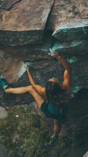 Empowered Rock Climbing Manifestation and Personal Growth Wallpaper
