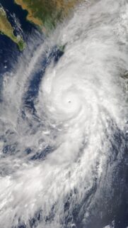 Satellite View of Massive Hurricane Vortex Over Ocean Wallpaper
