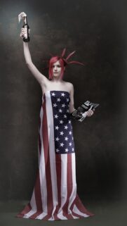 Edgy Punk Liberty Girl with American Flag Wrap Mobile Wallpaper