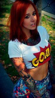 Stunning Redhead Woman with Comic Style Tattoos High Quality Wallpaper
