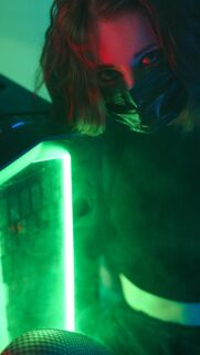 Cyberpunk Girl with Neon Green LED PC Setup Wallpaper for Mobile
