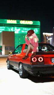 Anime Girl Sitting on Vintage Nissan Skyline Red Car Las Vegas Night Wallpaper