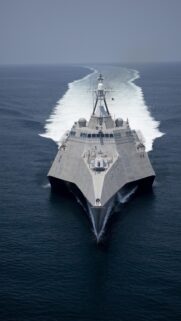 US Navy Littoral Combat Ship Sailing Through Deep Blue Ocean Wallpaper