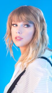 Taylor Swift Portrait High Quality Blue Background Mobile Wallpaper