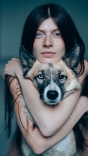 Stunning Woman and Dog with Heterochromia Eyes Portrait Wallpaper