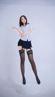Stunning Asian Model in Professional White Shirt and Black Skirt Wallpaper for Mobile